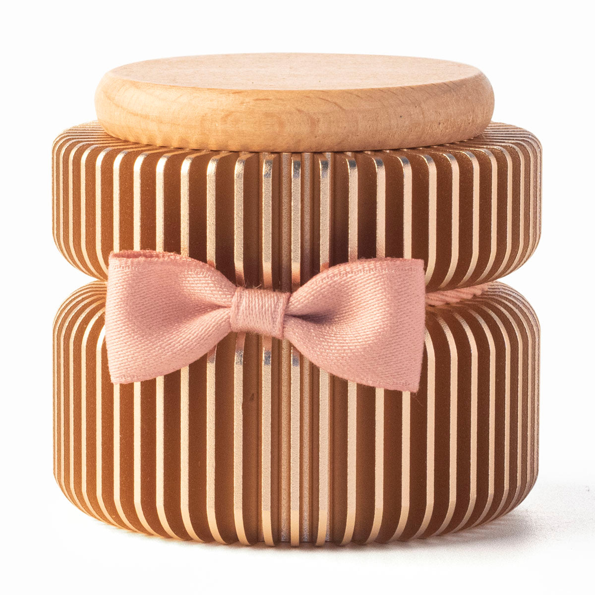Rose gold keepsake urn front view – anodized aluminum with champagne and gold vertical stripes, pink satin ribbon bow, natural beech wood lid